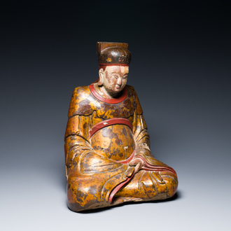 A Chinese or Vietnamese lacquered and gilt wood sculpture of Buddha, 16/17th C.