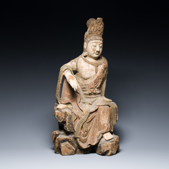 A Chinese polychromed wood sculpture of Guanyin, probably Ming