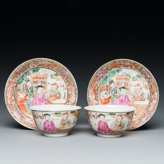 A pair of Chinese famille rose 'mandarin subject' cups and saucers, Qianlong