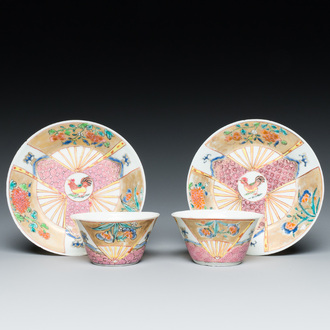 A pair of Chinese famille rose 'rooster' cups and saucers, Yongzheng