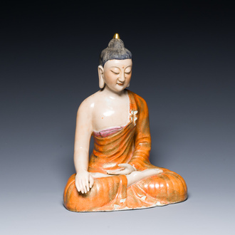 A Chinese famille rose figure of Buddha, Qianlong mark, 19/20th C.