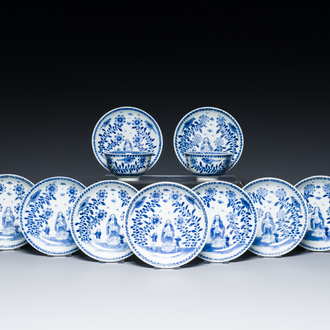 Nine Chinese blue and white 'Madonna and Child' saucers and two cups, Kangxi