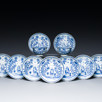 Nine Chinese blue and white 'Madonna and Child' saucers and two cups, Kangxi