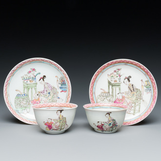 A pair of Chinese famille rose cups and saucers with a lady and a boy, Yongzheng
