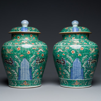 A pair of Chinese famille verte 'galloping horses' vases and covers, 19th C.