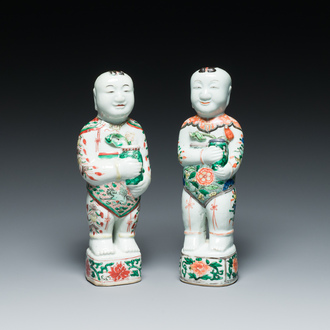 A pair of Chinese famille verte 'Hehe Er Xian' figures, Kangxi