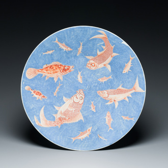 A large Chinese iron-red-decorated blue-ground 'carps' dish, 19th C.