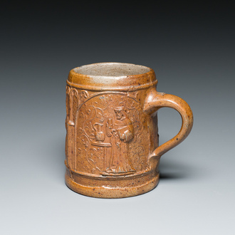 An unusual German stoneware mug depicting king Gambrinus, Cologne or Frechen, ca. 1600