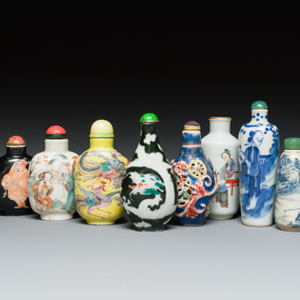 Eight Chinese blue and white, famille noire and famille rose snuff bottles, various marks, 19th C.