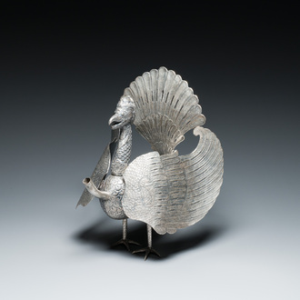 A rare Indonesian silver 'Garuda' oil lamp for the Wayang theatre, 'blencong', 19th C.