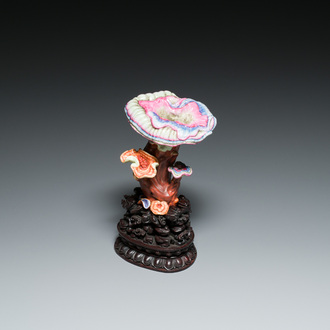 A Chinese famille rose 'lingzhi' sculpture on carved wooden stand, Qianlong mark, probably Republic