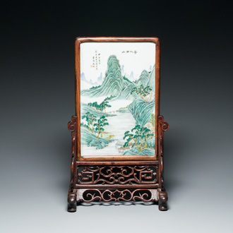 A Chinese famille verte plaque mounted in a wooden table screen, signed Li Huan 李澣, dated 1924