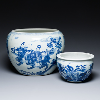 Two Chinese blue and white fish bowls or jardinières with figurative design and mythical animals, 19/20th C.