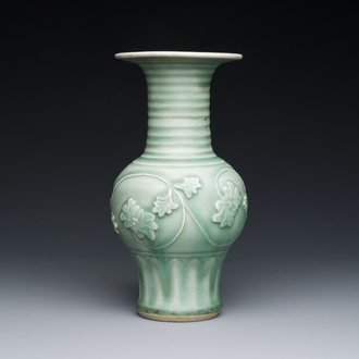 A Chinese Longquan celadon 'peony scroll' vase, Yuan