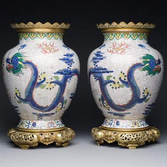 A pair of Chinese white-ground cloisonné 'dragon' vases with gilt bronze mounts, 19th C.