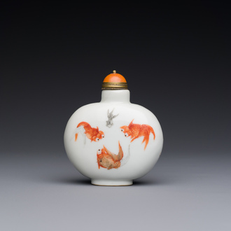 A Chinese iron-red and grisaille 'goldfish' snuff bottle, Daoguang mark and of the period