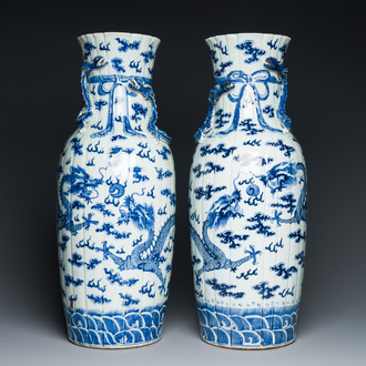 A pair of Chinese blue and white 'dragon' vases, 19th C.