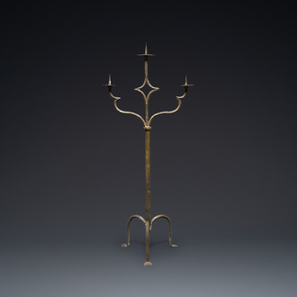 A large French gothic wrought iron three-lights candlestick, ca. 1500