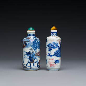 Two Chinese blue, white and copper-red snuff bottles, 19th C.