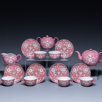 A Chinese 15-piece tea service with lotus scrolls on a purple ground, Guangxu mark, 20th C.