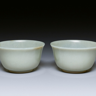 A pair of Chinese pale celadon jade bowls, 19th C.