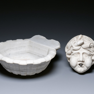 A grotesque white Carrara marble wall fountain and basin, Italy, 19th C.