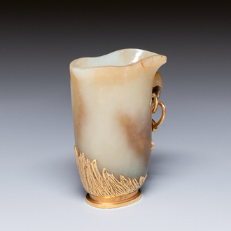 A Chinese jade rhyton with 18k gold mount, 19th C.