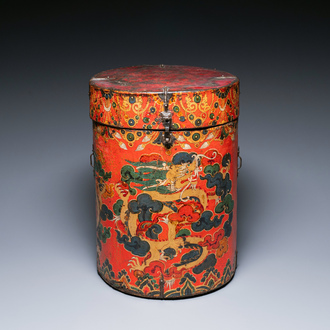 A large leather-clad wooden box and cover painted with dragons on a red ground, Tibet, 17/18th C.