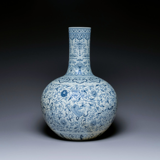 A large Chinese blue and white bottle vase, Qianlong mark, 19/20th C.