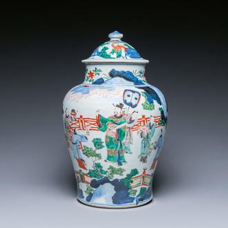 A Chinese wucai vase and cover with narrative design, Transitional period