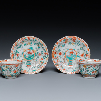 A pair of Chinese famille verte cups and saucers, 19th C.