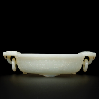 An important Chinese chrysanthemum-shaped very pale celadon jade marriage bowl, 18th C.
