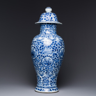 A Chinese blue and white vase and cover with floral design, Kangxi