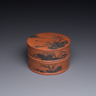 A Chinese blue-enameled Yixing stoneware box and cover with a mountainous landscape, 18/19th C.