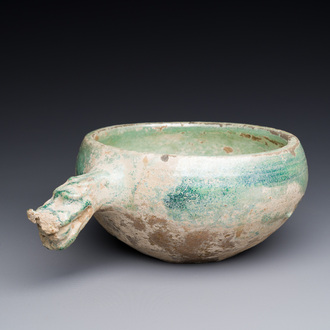 A Chinese monochrome green-glazed pottery scoop, Han