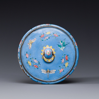 A Chinese Canton enamel circular hand mirror, early 19th C.