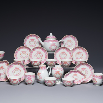 A 28-piece Chinese puce-enamelled and gilt armorial tea service with crowned monograms, Qianlong