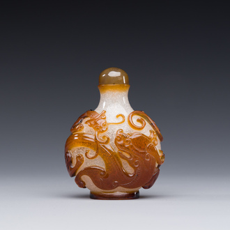 A rare Chinese brown-overlay white glass snuff bottle with chilong design, Qianlong/Jiaqing