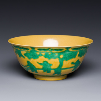 A Chinese yellow-ground 'playing boys' bowl, Yongzheng mark and prossibly of the period