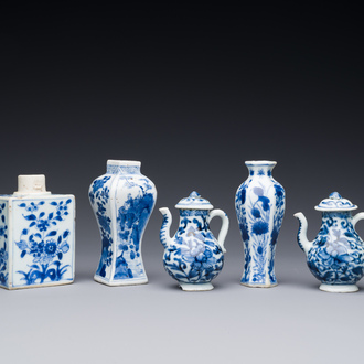 Two Chinese blue and white vases, two miniature jugs and a tea caddy, Kangxi