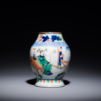 A Chinese wucai vase with figures and calligraphy, 19th C.