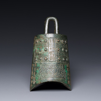 A rare Chinese inscribed archaic bronze bell, Eastern Zhou