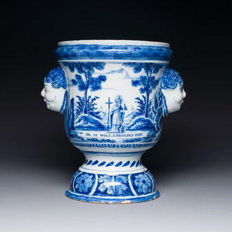 A Dutch Delft blue and white jardiniere depicting Saint Willibrord and John the Baptist, 18th C.