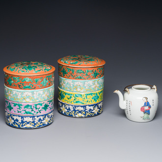 A pair of Chinese famille rose four-tier stacking boxes and a teapot, 19th C.