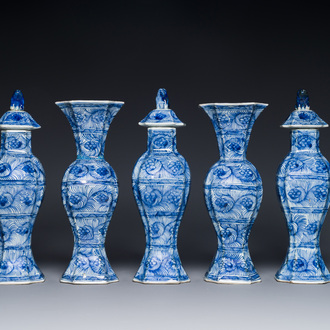 A Chinese blue and white garniture of five vases with floral design, Kangxi