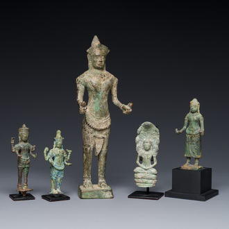 A group of five bronze figures of Shiva, Bodhisattva and Uma, Cambodia, 11/16th C.