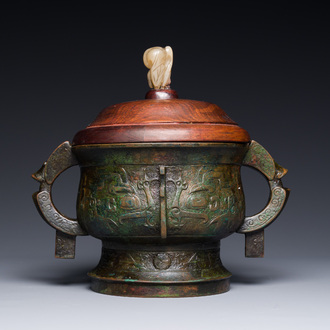 An unusual Chinese archaistic bronze censer with wooden cover, 'gui', Song