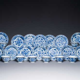 Ten Chinese blue and white cups and fourteen saucers with floral design, lingzhi mark, Kangxi