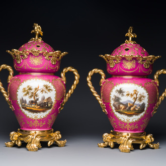 A pair of French parcel-gilt polychrome pink-ground porcelain potpourri vases, Jacob Petit, Paris, 19th C.