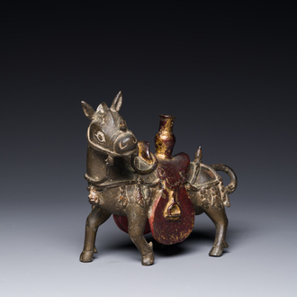 A rare Chinese partly lacquered and gilt bronze incense holder in the shape of a horse, Yuan/early Ming